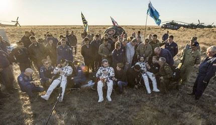 NASA astronaut Jeff Williams, left, Russian cosmonaut Alexey Ovchinin of Roscosmos, center, and Russian cosmonaut Oleg Skripochka of Roscosmos sit in chairs outside the Soyuz TMA-20M spacecraft a few moments after they landed in a remote area near the town of Zhezkazgan, Kazakhstan on Wednesday, Sept. 7, 2016(Kazakh time). Williams, Ovchinin, and Skripochka are returning after 172 days in space where they served as members of the Expedition 47 and 48 crews onboard the International Space Station. Photo Credit: (NASA/Bill Ingalls)